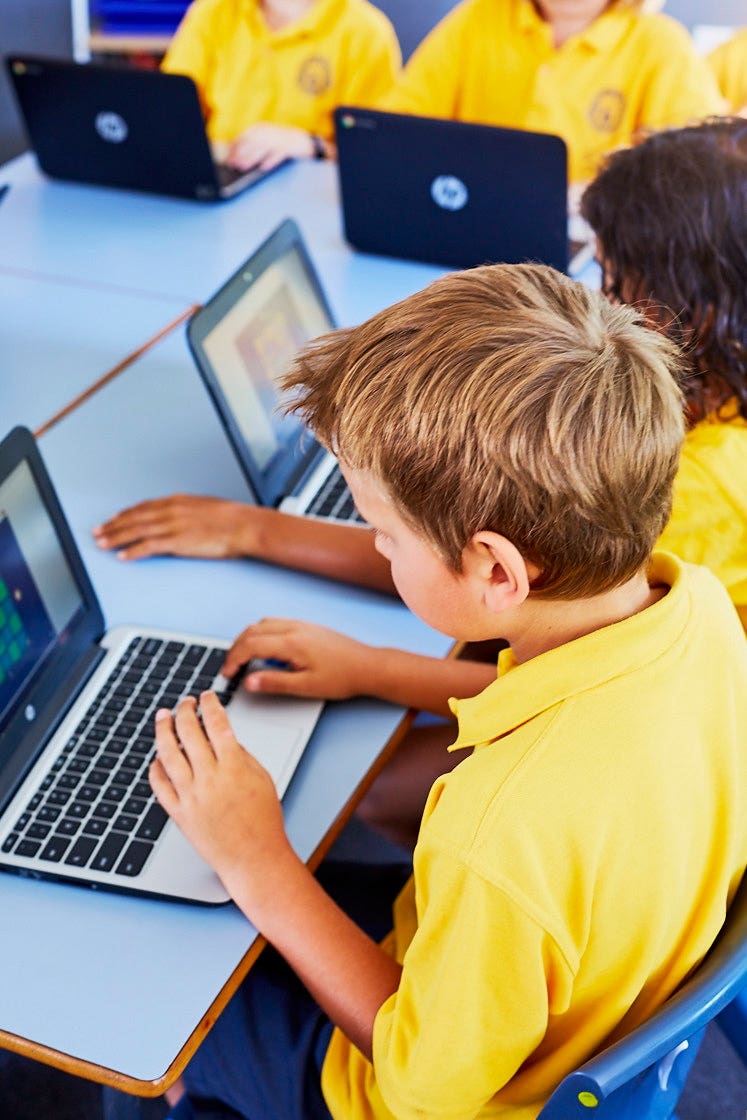 Image of student on a Chromebook